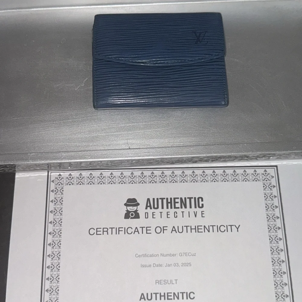 Louis Vuitton compact wallet with COA